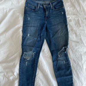 Levi’s 721 high rise skinny ripped jeans